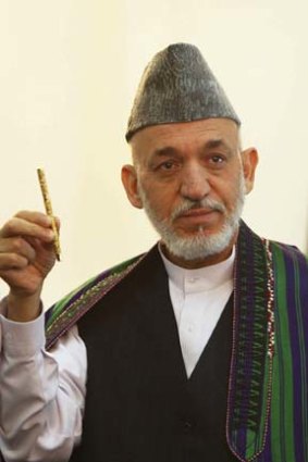 Hamis Karzai's administration denies claims that permission was given for an SAS raid.