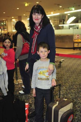 Kristina Purcell and son Alexander had to rebook with Virgin after their holiday flight to Canberra was cancelled.