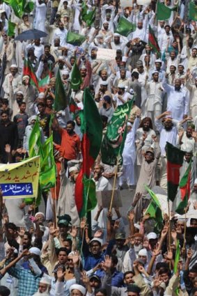 Pakistani Sunni Muslims protest in Karachi against the suicide bomb attacks on a shrine. <i>Photo: AFP/Rizwan Tabassum</i>