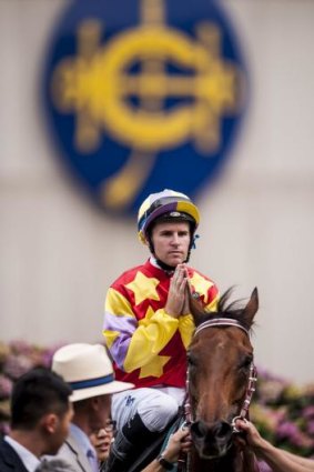 Grand designs: Tommy Berry celebrates after winning the QEII Cup  on Designs on Rome in Hong Kong in April.
