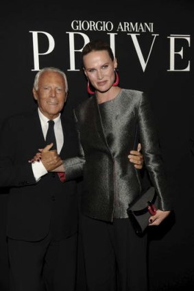 Giorgio Armani at his Prive show with Francesca Cumani.