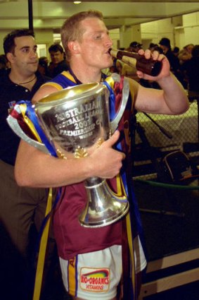 Michael Voss celebrates after the 2001 Grand Final.
