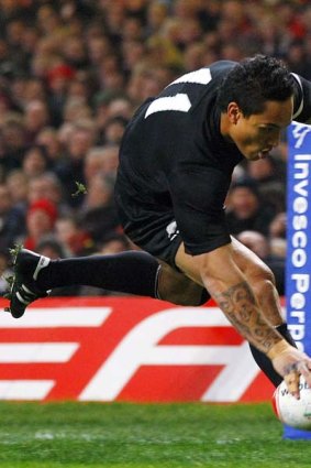 New Zealand's Hosea Gear scores is first try against Wales.