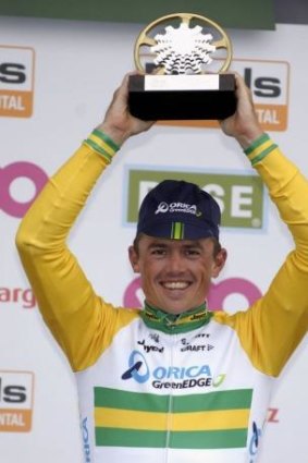 Winners are grinners: Simon Gerrans celebrates victory.