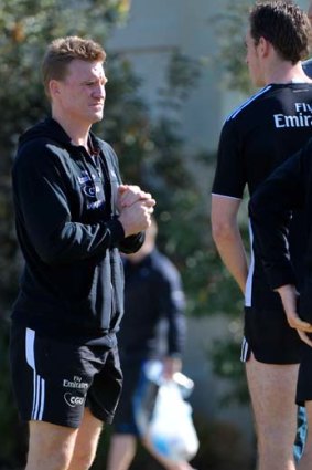 Nathan Buckley with suspended captain Nick Maxwell.