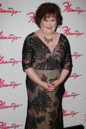 Susan Boyle cuts a comfortable, elegant figure on the red carpet, wearing a flattering embellished dress.