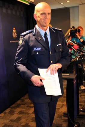 Simon Overland after a press conference on Thursday  to announce he was stepping down as Victoria's Police Commissioner.