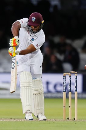 West Indies' Kieran Powell is bowled by England's James Anderson. 