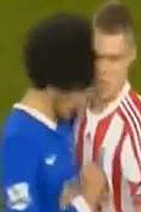 Brain snap &#8230; Fellaini delivers a Liverpool kiss.