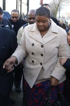 Too much to bear ... Hadiya Pendleton's mother, Cleopatra, and brother Nathaniel, arrive at a Chicago funeral home for the wake.