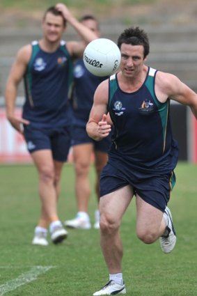 Steaming Saint: Stephen Milne gets in some training before the international rules match on Friday night.