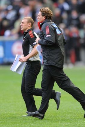 Testing times: Essendon assistant coach Simon Goodwin (left) and coach James Hird have been questioned by ASADA.