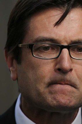 Assistant Minister for Climate Change, Greg Combet, announces the dumping of the home insulation scheme today.