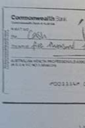 A cheque signed by Kathy Jackson.