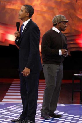 Barack Obama on stage with MTV host Sway Calloway in a televised forum. Young voters put him on the defensive on the economy, gay rights and race relations.