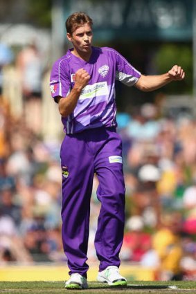 Crucial wicket: Ben Laughlin of the Hurricanes celebrates dismissing Usman Khawaja.