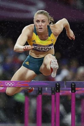 Sally Pearson on her way to winning the women's 100m hurdles final in London.