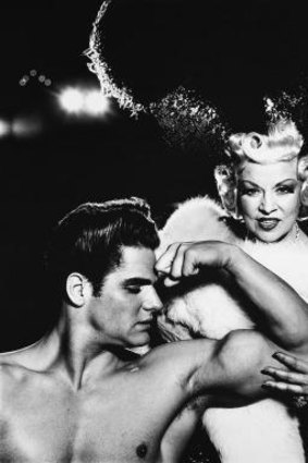Mae West, actor, with Mr. America, New York, 1954 Photograph by Richard Avedon © The Richard Avedon Foundation