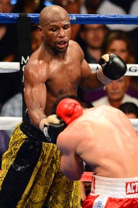 Floyd Mayweather throws a right to the face of Robert Guerrero.