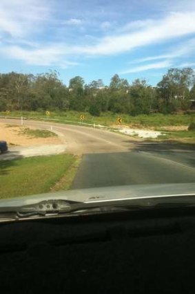 Young's Crossing Road has flooding problems.