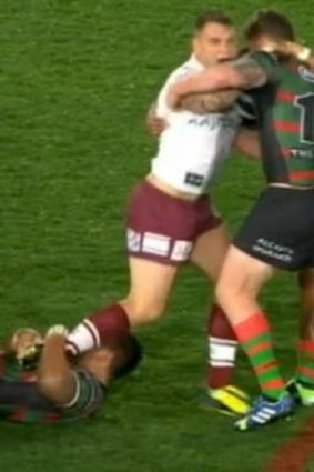 Twist and shout: Anthony Watmough appears in pain during the challenge.