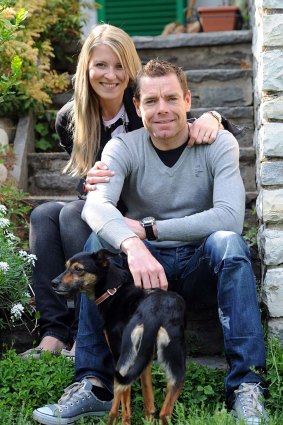 ''All you have to do is stay calm and go as hard as possible'' ... Cadel Evans with his wife, Chiari Passerini, and their dog, Molly.