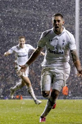 Snow job: Tottenham's Clint Dempsey celebrates his goal.
