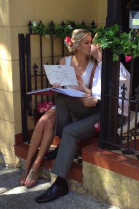 Bride and groom Lorraine Murphy and Wade Tink kiss at their doorstep wedding 'elopement' in Bondi.