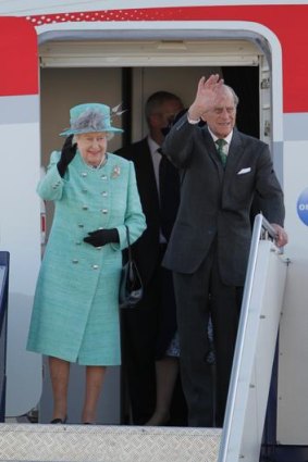 The Queen and Prince Philip arrive in Canberra yesterday.
