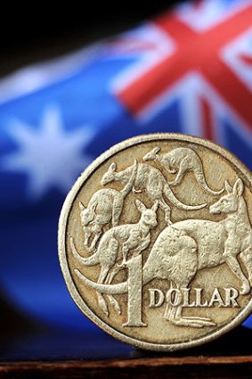 The dollar is benefitting from a once-in-a-lifetime resources boom, Guy Debelle says.