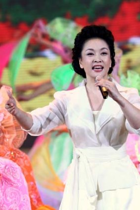 Dazzling singer ... Peng Liyuan during a grand celebration for National Day in Beijing.