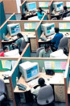 Indian employees working at a call centre in Bangalore.