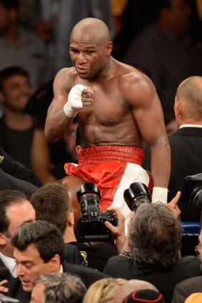 Mayweather celebrating after defeating Miguel Cotto in 2012.