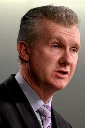 "Infinitely better": How Tony Burke described the conditions on Manus Island.
