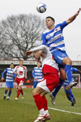 Air time ... Ian Harte, right, vies with Stevenage's Chris Beardsley.
