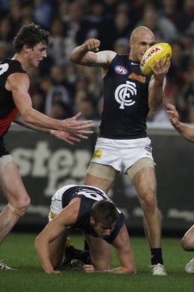 No contest: Blues captain Chris Judd shows his domination and wins another possession.