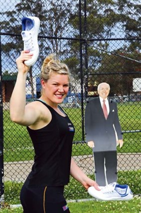 Aiming high... discus champion Dani Samuels put her arm to the test.
