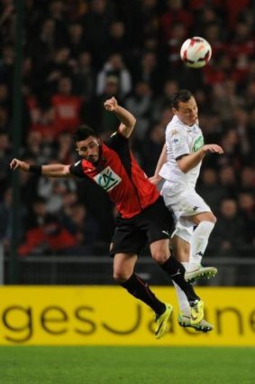 Rennes forward Romain Alessandrini, left, vies with Angers midfielder Vincent Manceau.