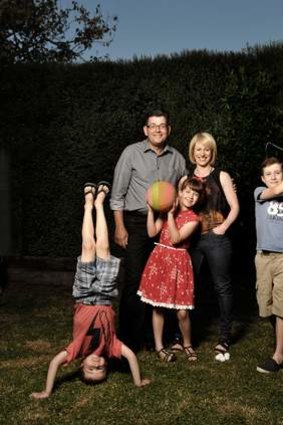 Balancing act: Daniel and Catherine Andrews with their children (left to right), Joseph, Grace and Noah.