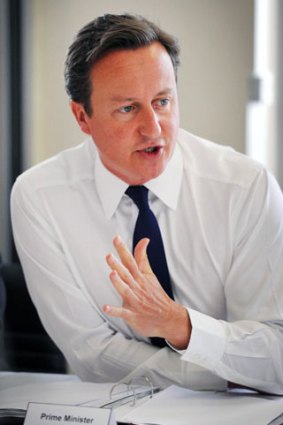 The British Prime Minister, David Cameron, is under pressure to call a judge-led inquiry into the phone-hacking scandal.
