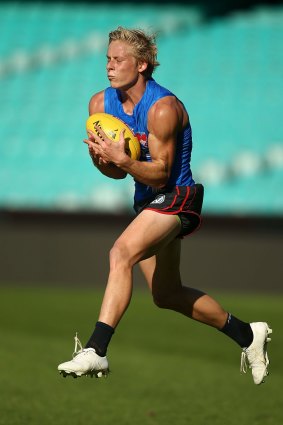 Back in the fold: Isaac Heeney at Swans training.