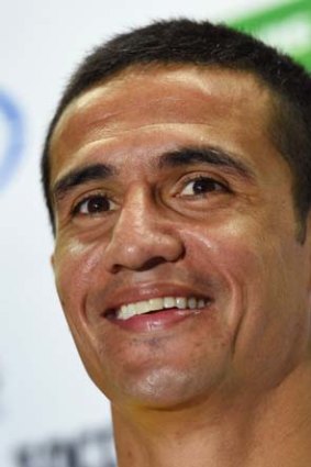 Tim Cahill speaks at a press conference after a team training run in Vitoria.
