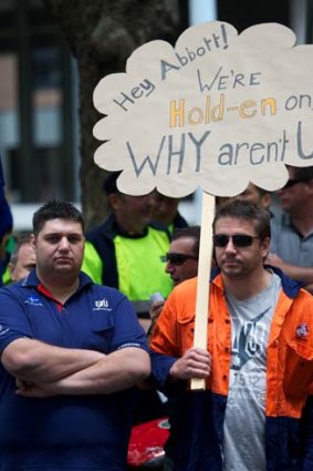 Large job losses: Union workers protest against the government decision not to continue subsidising Holden in Australia.
