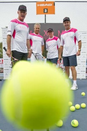 John Fitzgerald, Maxim founding partner Mark Peatey, Cerebral Palsy Alliance CEO Rob White and Todd Woodbridge at the North Woden Tennis Club on Thursday.