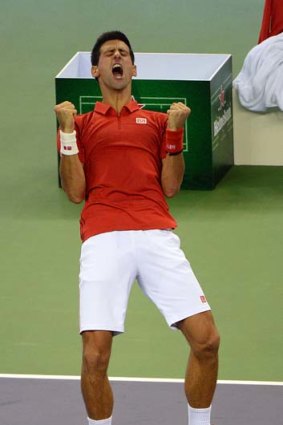 Oh yeah: A jubilant Novak Djokovic.