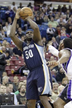 Memphis Grizzlies forward Zach Randolph shoots over Sacramento Kings  forward Jason Thompson.