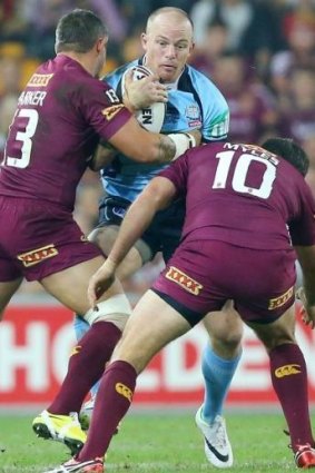Punishing: Origin players are hard pressed to back up for their club sides in the same week.