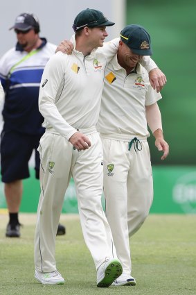 "It's obviously been a very tough Test match for our fast bowlers": Steve Smith, left, with David Warner.