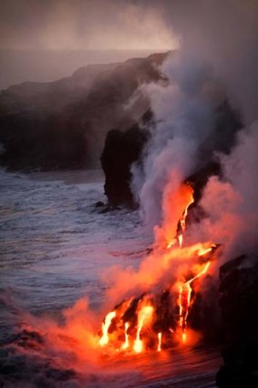 The Puu Oo cone of Kilauea Volcano in Hawaii, one of the few places in the world you can see lava flowing into the ocean.