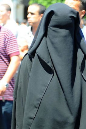 Burqas may be banned in Italy.